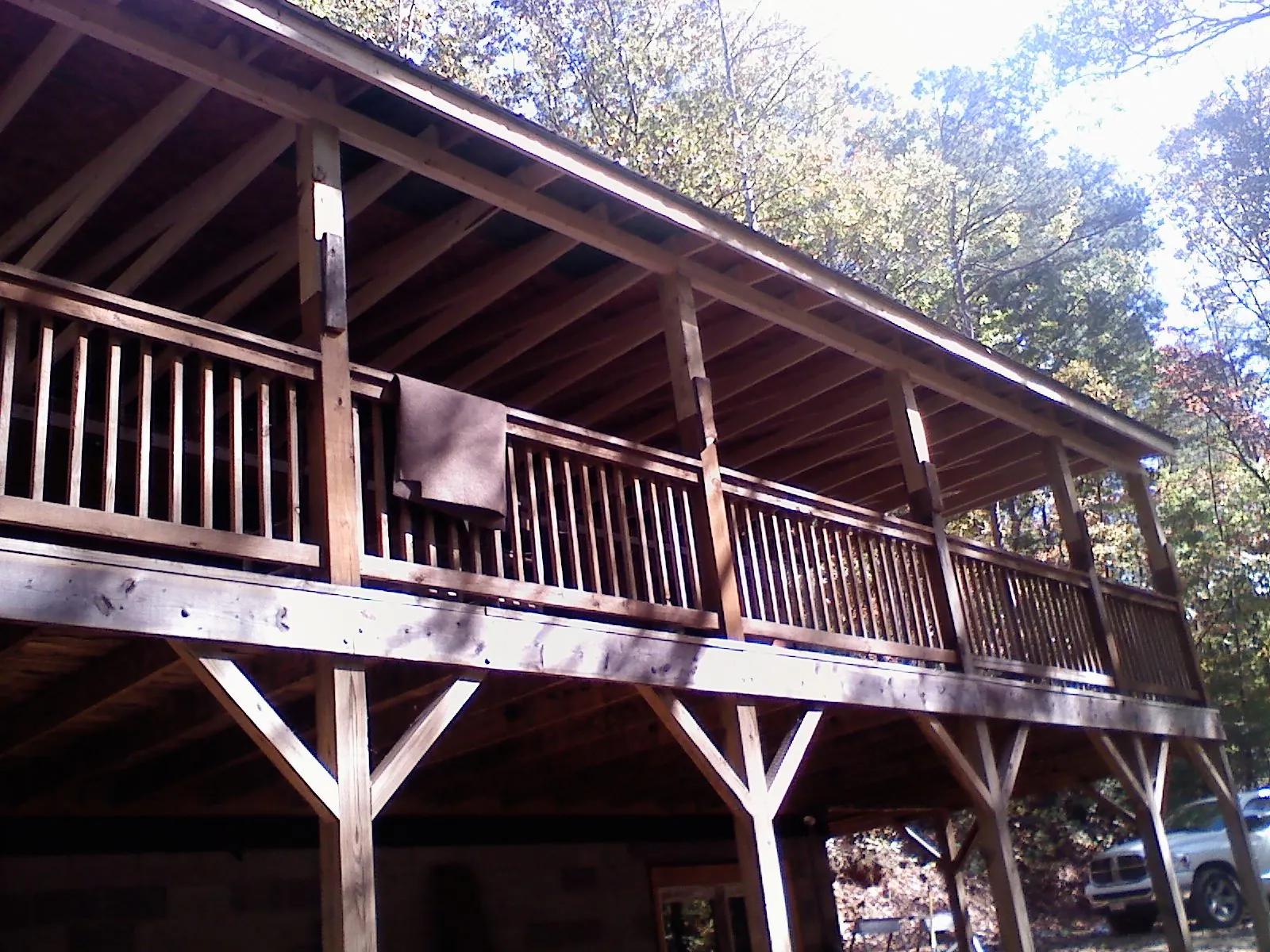 Timber framing under a new elevated porch and deck — Roof Leak Repair in Perryopolis by Roofing Brothers